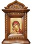 carved wooden icon with patina-dark color