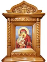 carved wooden icon with patina